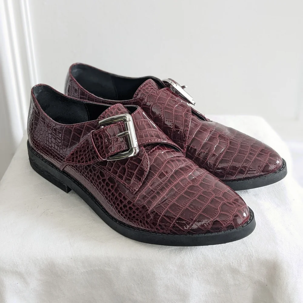 Patent leather loafers by Aldo